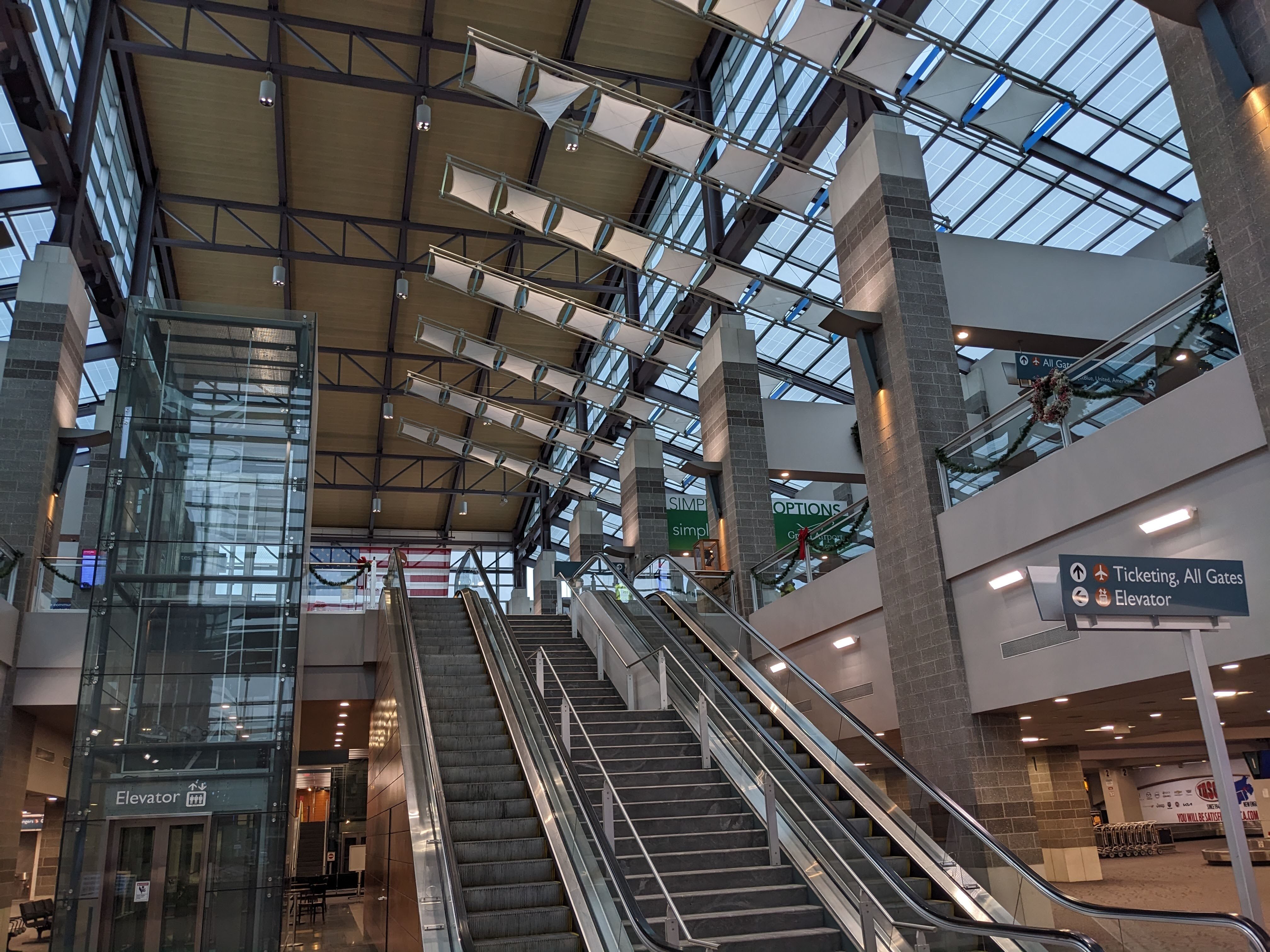 glass atrium interior at T F Green airport serving Providence, RI